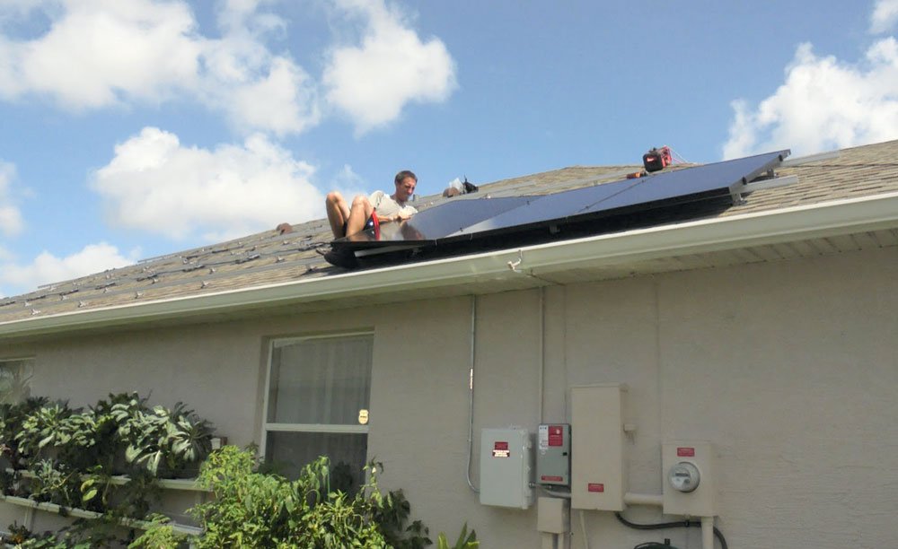 Solar panels being installed on rooftop